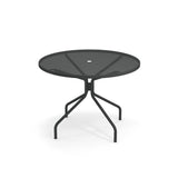 A round, black Cambi Table with a mesh top and a central hole for an umbrella. Its four legs angle outward and curve at the base for stability. Suitable as an outdoor/indoor table, it features a plain white background.