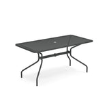 This rectangular mesh top table features a black metal finish, four curved legs, and a central hole for an umbrella. Its sturdy crossbar design makes it the perfect outdoor drink table for patios or gardens.