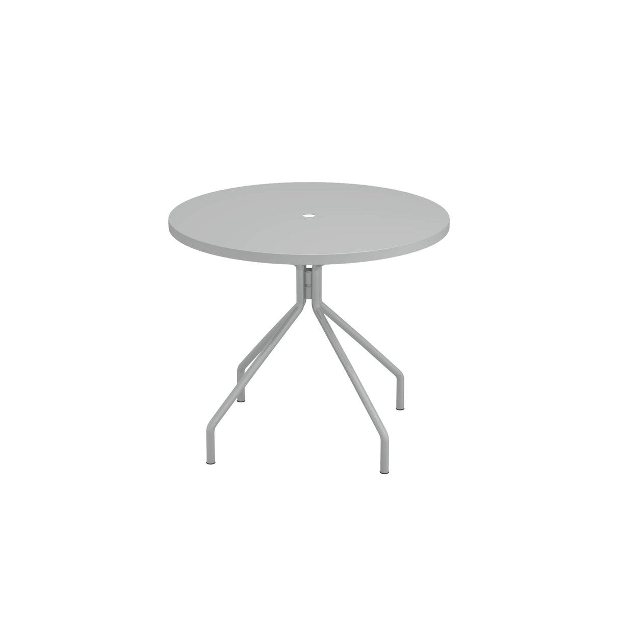A round, light gray outdoor table with a central hole, supported by four angled legs branching from a single stem. This minimalistic piece is made in Italy, featuring clean lines and a smooth tabletop against a plain white background.