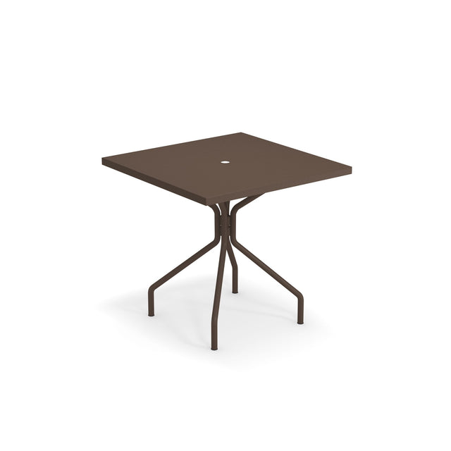 A square, brown outdoor solid table made in Italy with a flat steel top and a small round hole in the center. It features four legs that curve outward, connected to a central support beneath the tabletop, all set against a plain white background.