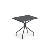 A small, rectangular solid steel table with a flat top and four angled legs branching from a central support, set against a plain white background. The modern, minimalistic design makes it ideal as an indoor outdoor table.