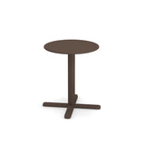 A small, round, brown tilt top table with a single central pedestal and a four-legged base, standing on a plain white background. The design is simple and modern, featuring clean lines and a smooth surface.