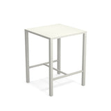 The Nova Bar Table is a simple, modern square high table with a white tabletop and four straight, light gray steel legs. Designed for outdoor/indoor use, the legs feature horizontal support bars near the bottom for added stability.