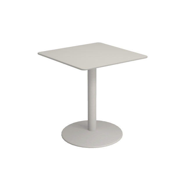 A simple, modern bistro table with a flat, light gray top and a single central steel pedestal base stands on a round, flat base. Perfect as an outdoor indoor table, it is photographed against a plain white background.