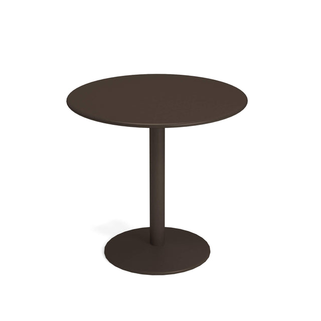 A simple, modern round bistro table with a dark brown top and a single central steel pedestal base. The pedestal is cylindrical, supporting the tabletop and connecting to a flat, circular base. The background is plain white.