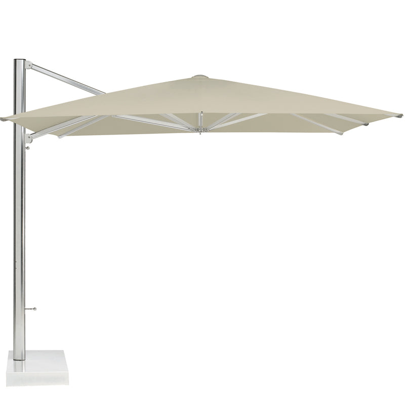 A large, square beige Cantilever Umbrella with an anodized aluminum pole on the left side, anchored by a rectangular base. The canopy is supported by metal ribs, creating a modern and sturdy structure designed for shade.