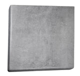 A square, gray concrete block with a slightly rough surface and subtle textures. Its sharp edges and uniform color hint at solid construction—ideal for use as an outdoor table top, thanks to its heat and stain resistant qualities. The background is plain white.