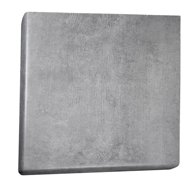 A square, gray concrete block with a slightly rough surface and subtle textures. Its sharp edges and uniform color hint at solid construction—ideal for use as an outdoor table top, thanks to its heat and stain resistant qualities. The background is plain white.