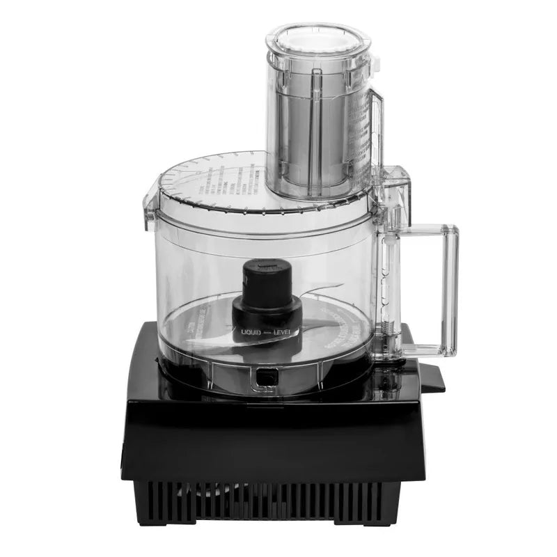 A clear 1.7 liter food processor bowl with a lid, handle, and feed chute sits on a glossy black rectangular base. The bowl contains a central blade attachment, and the Waring appliance is viewed from a front angle on a white background.