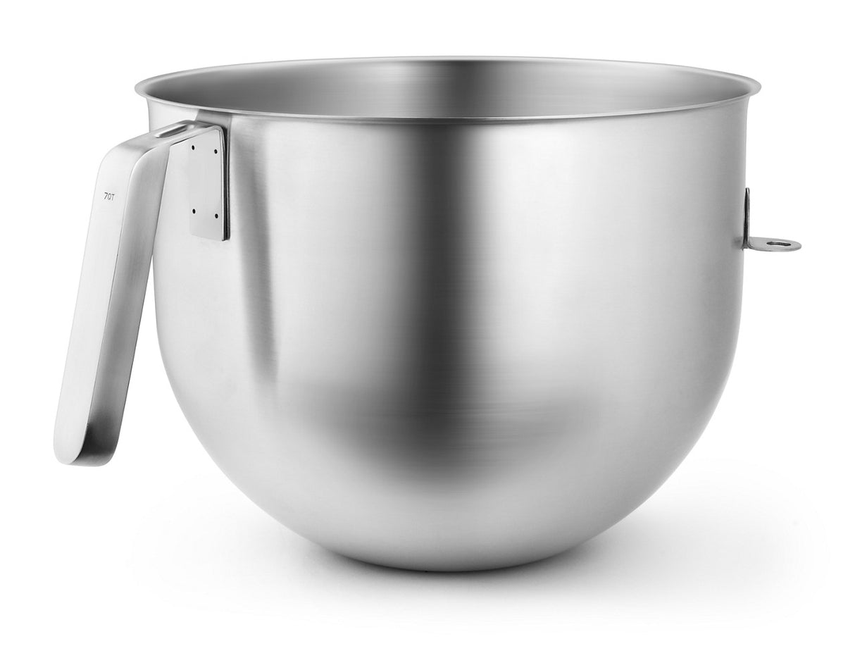 A large, shiny 7 quart KitchenAid Mixer Bowl made of stainless steel with a sturdy handle on the left and a small tab on the right, set against a white background. The bowl features a smooth, rounded shape and a brushed metallic finish.