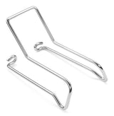 A stainless steel wire book stand with two angled arms and hooked ends. The KHBC400WMB wall mount bracket-inspired back support holds books or tablets upright, while the minimalist design echoes KitchenAid Commercial quality.