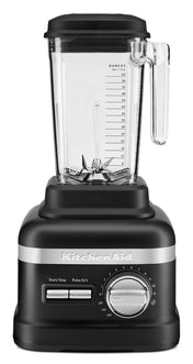 A black KitchenAid Commercial Blender with a clear 60 oz pitcher showing ounce measurements, a right-side handle, silver speed dial, and Start/Stop and Pulse H/L buttons on the base, all set against a white background.