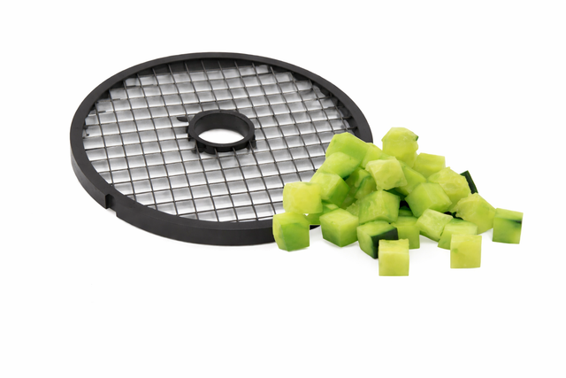 A black Hobart dicer plate lies on a white surface beside a pile of small, even cucumber cubes, illustrating the stainless steel tool’s purpose of cutting vegetables into uniform pieces.