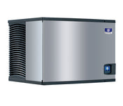 A stainless steel Indigo NXT Series Ice Maker featuring black vents on the left, a blue and white brand logo at the front top right, and a small control panel beneath it. This air-cooled ice machine has a boxy shape and a sleek, modern look.