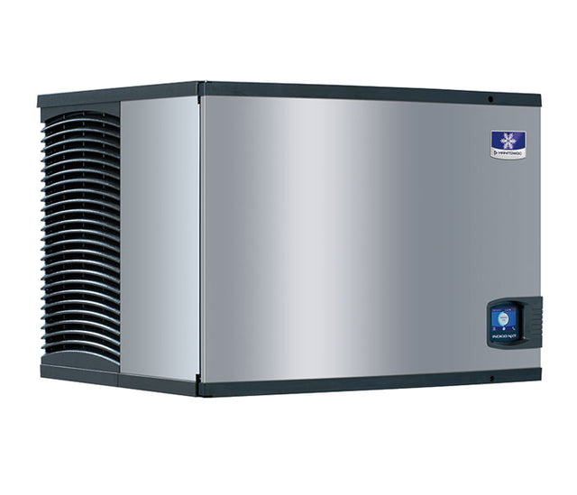 A stainless steel Indigo NXT Series Ice Maker featuring black vents on the left, a blue and white brand logo at the front top right, and a small control panel beneath it. This air-cooled ice machine has a boxy shape and a sleek, modern look.