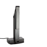 A black, upright document scanner with a rectangular base and a slim vertical arm, shown on a white background. The NSF-certified device is plugged in, with the power cord extending from the left side. The design is minimal and modern.
