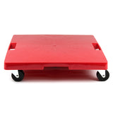 The Krowne red plastic Square Dolly features two black swivel caster wheels and two rectangular cut-out handles on each side. Its textured surface provides grip, and the image shows the dolly with handle from a low, front-facing angle against a white background.
