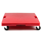 The Krowne red plastic Square Dolly features two black swivel caster wheels and two rectangular cut-out handles on each side. Its textured surface provides grip, and the image shows the dolly with handle from a low, front-facing angle against a white background.