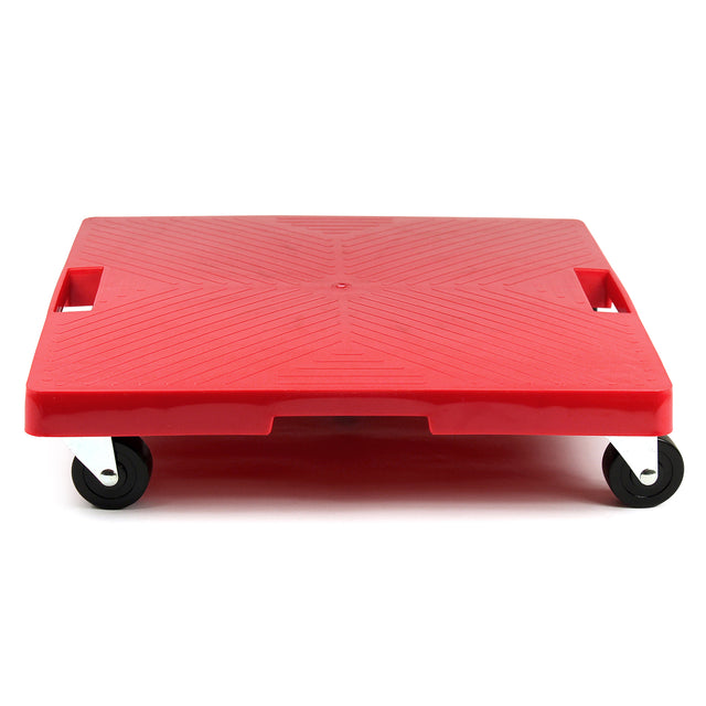 The Krowne red plastic Square Dolly features two black swivel caster wheels and two rectangular cut-out handles on each side. Its textured surface provides grip, and the image shows the dolly with handle from a low, front-facing angle against a white background.