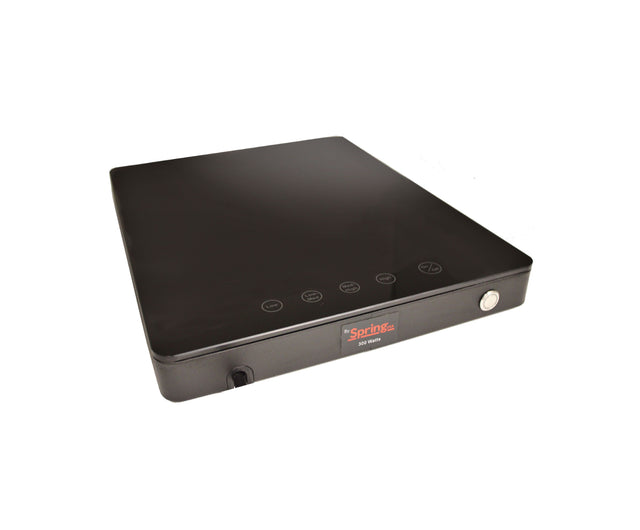 A black, rectangular low profile induction cooktop with a smooth, glossy surface. Four circular touch control icons are on the front, alongside a power button. The Spring brand and model Z10 Ultra are labeled on this sleek countertop induction range.