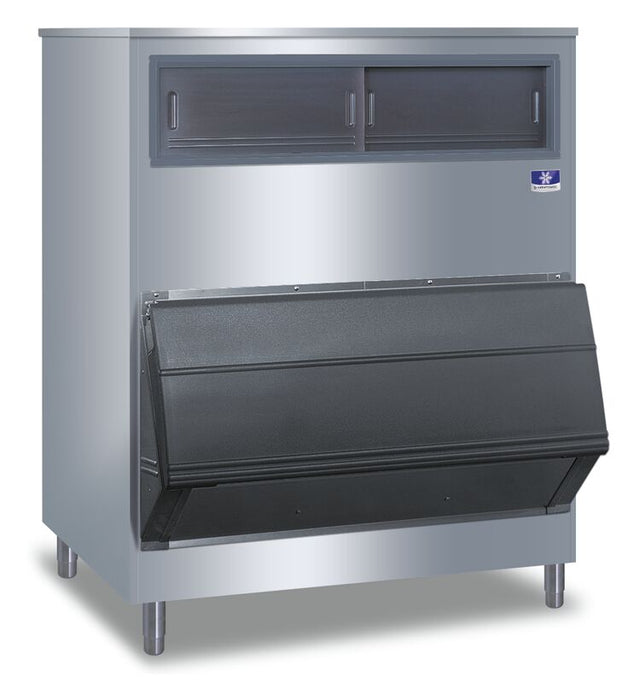 A large commercial ice machine with a stainless steel body and four metal legs, featuring an upright ice storage bin. It has two black sliding doors up top and a wide, black front door for easy access to the Manitowoc F1300's abundant ice supply.