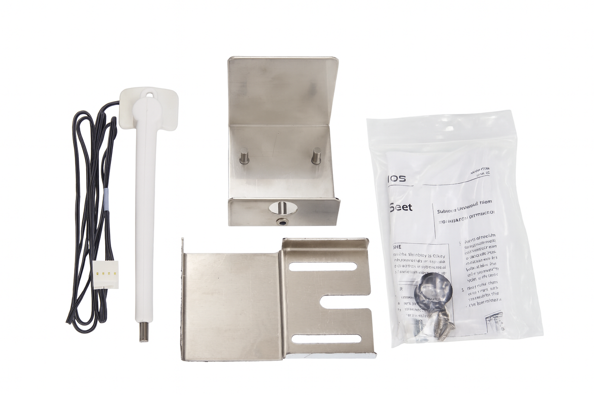 A Dispenser Thermostat Kit for an ice machine, featuring a temperature probe with black cable, two metal mounting brackets, screws and keys in a plastic bag, and a printed instruction sheet are arranged on a white background.