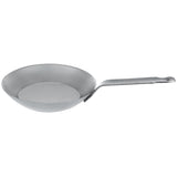 Angled side view of the Matfer Bourgeat 062001 black steel frying pan with riveted handle, ideal for commercial kitchens using gas, electric, or induction.