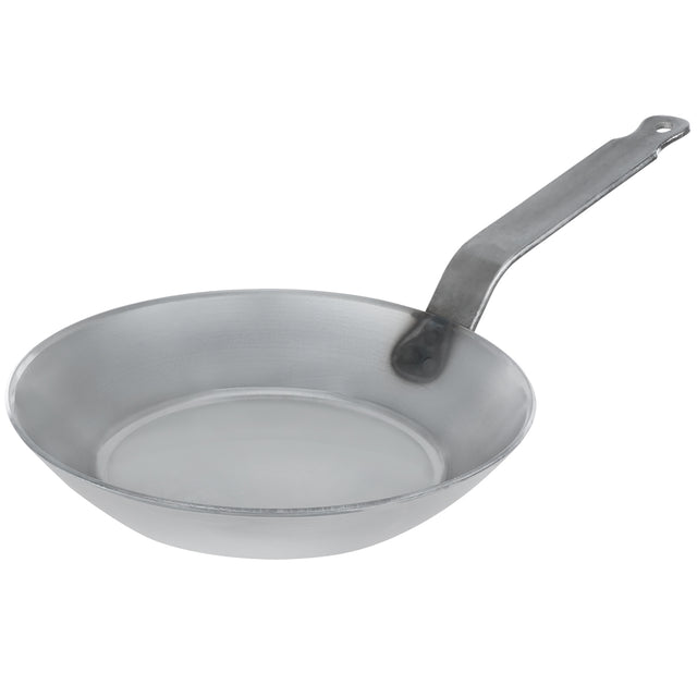 Top-angled view of the Matfer Bourgeat 062001 black steel fry pan, highlighting the wide cooking surface and riveted handle suitable for high-heat stovetops.