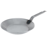 Angled top view of the Matfer Bourgeat 062002 frying pan showing the spacious cooking surface and steel handle, ideal for commercial kitchen use.