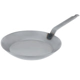 Close-up angled shot of the Matfer Bourgeat 062004 professional black steel pan designed for induction and gas ranges