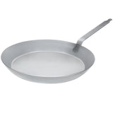 Matfer Bourgeat 17-3/4 inch black steel frying pan with robust riveted handle, perfect for commercial stovetop cooking