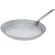 Matfer Bourgeat 17-3/4 inch black steel frying pan with robust riveted handle, perfect for commercial stovetop cooking