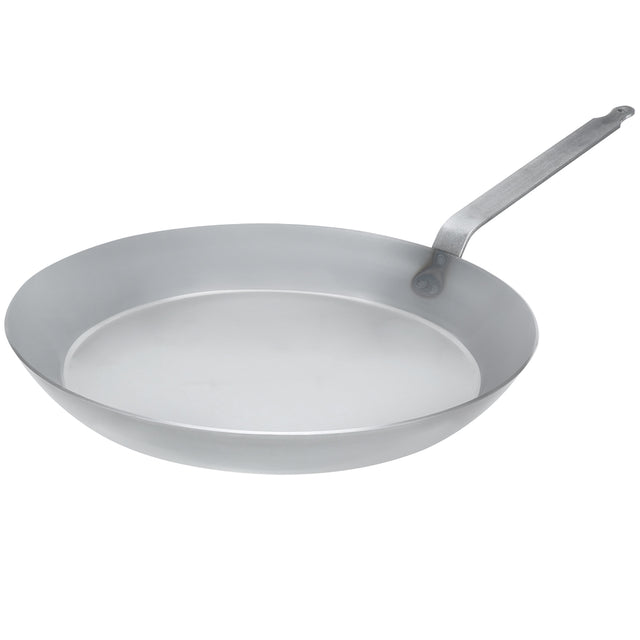 Matfer Bourgeat 17-3/4 inch black steel frying pan with robust riveted handle, perfect for commercial stovetop cooking