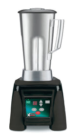 A heavy duty blender with a stainless steel container and digital display on a black base. The control panel features Low, High, Pulse, Stop buttons and a 30-second digital timer. It has a large handle and secure lid for safe blending.