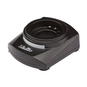 A black, rectangular single charger cradle with a circular slot in the center, designed for the Waring MXECHG1. Three metal charging contacts are inside the slot, and a logo with text is printed on the front left side of the cradle’s surface.