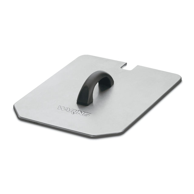A rectangular stainless steel press with beveled corners, a black curved handle, and the brand name "Waring" embossed near the handle. Ideal for use with a 15-lb fryer or as a Night Cover, it features a small notch on one side and rests on a white background.