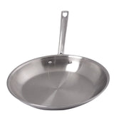 A stainless steel fry pan with an aluminum core, flat base, and gently sloped sides features a long, straight handle with a hole for hanging. The pan is clean, shiny, and rests on a white background.