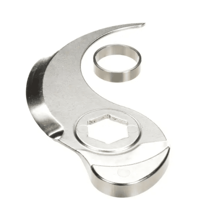 A curved, stainless steel R30T food processor blade with a smooth edge and hexagonal central hole, labeled as Blade Only, is shown alongside a separate metal ring on a white background. The blade features a reflective surface.