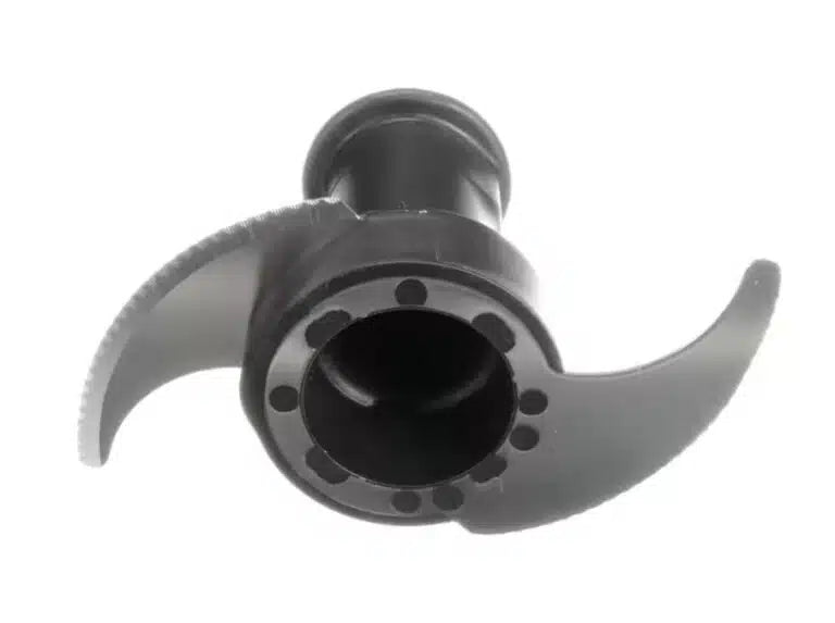 A close-up photo of a black plastic and metal Robot Coupe food processor blade with two fine serrated, stainless steel S blades attached to a cylindrical central hub. The hub has multiple round holes near its base. The background is plain white.