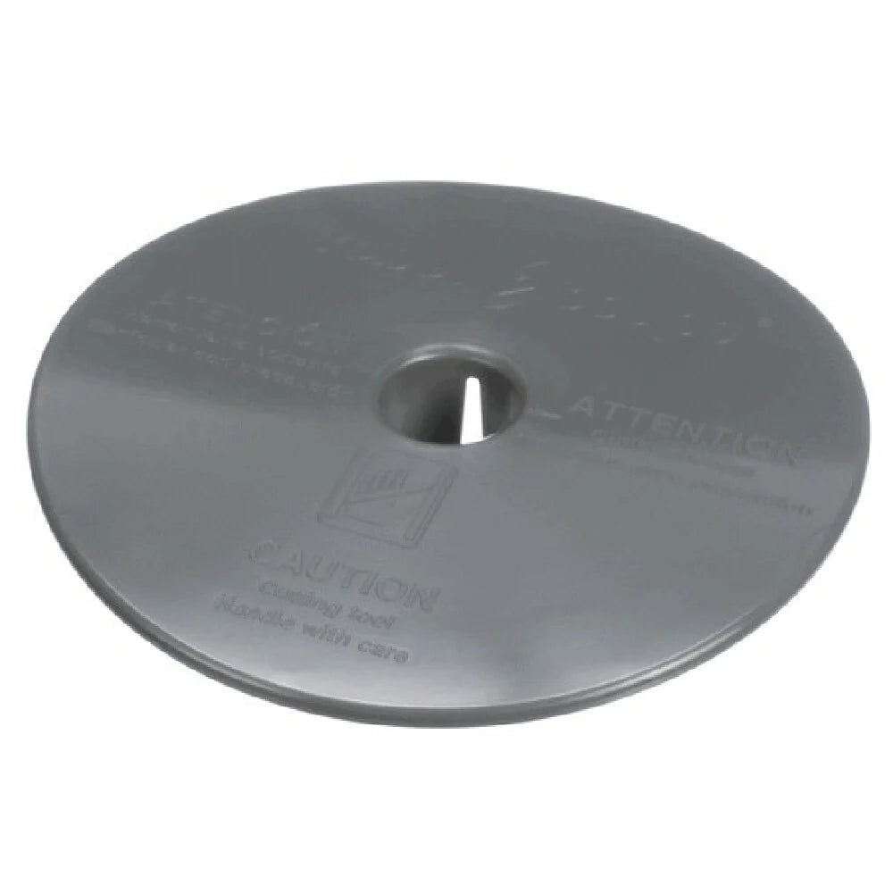 A round, flat, metallic disc with a central hole and slightly raised center, this Dicing Grid Protector features indented warning text and an icon advising caution. Designed for large machines like Robot Coupe, it has a smooth, reflective finish.