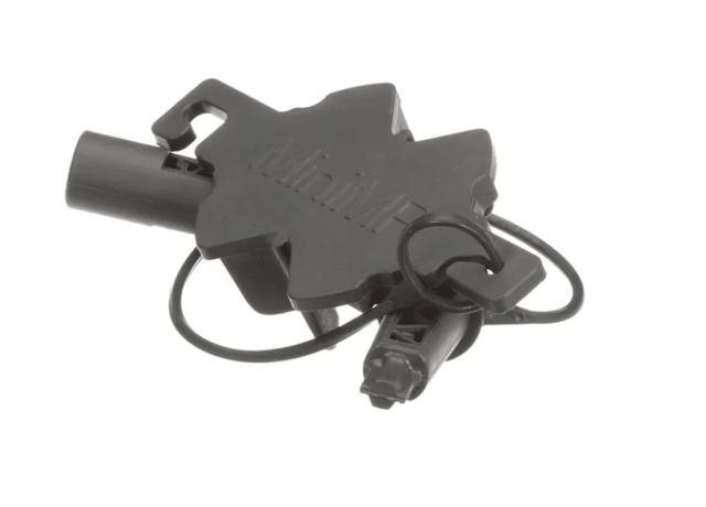 A black, star-shaped plastic Blade Assembly Tool (89058) with several protruding functional tips, a hooked clip, a circular key ring, and engraved text on its flat surface. The tool is photographed against a plain white background.