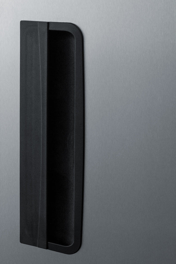 A close-up of a modern refrigerator door handle, black and rectangular, mounted vertically on a smooth, brushed stainless steel surface, showing part of the appliance’s sleek exterior design—ideal for use as a commercial reach-in freezer in professional settings.