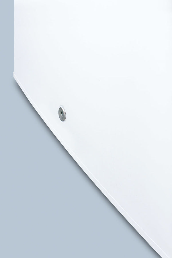 A close-up of a smooth white surface, likely a medical refrigerator side panel, with a single silver screw or circular fitting near the lower left. The background and surrounding area are a soft blue-grey. The design is minimal and clean.