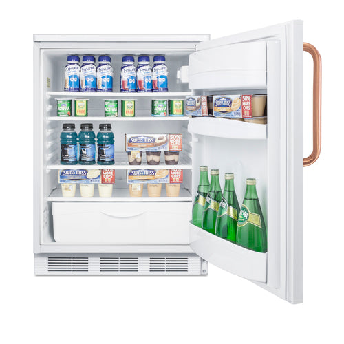 An open counter height refrigerator stocked with bottled drinks, yogurt, pudding cups, and green glass bottles in the door. Shelves are neatly arranged with items facing forward. The handle on the door is copper-colored. The fridge has a lower drawer and white interior.