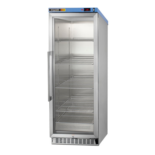 A tall, stainless steel, commercial refrigerator with a glass front door, side handle, and four empty wire shelves; digital temperature display is at the top right. The unit stands on a vented base and has a blue brand label on the top left. Designed with durability in mind, this refrigerator incorporates passive heating technology similar to that used in modern blanket warmer units for consistent interior temperatures.