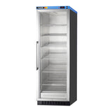 An upright commercial glass-door refrigerator with a metal frame, side handle, and five empty adjustable shelves inside. The control panel is located on the top right, and the brand label is on the top left. The unit stands on a black vented base and features passive heating technology for efficient temperature management.