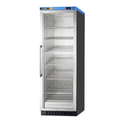 An upright commercial glass-door refrigerator with a metal frame, side handle, and five empty adjustable shelves inside. The control panel is located on the top right, and the brand label is on the top left. The unit stands on a black vented base and features passive heating technology for efficient temperature management.