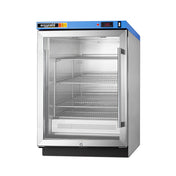 A stainless steel Accucold medical refrigerator with a glass front door is shown. Designed for medical environments, it has two adjustable wire shelves, a digital temperature display, and a blue control panel at the top. The refrigerator, which could be paired with a blanket warmer or other passive heating technology for comprehensive patient care, is empty and set against a plain white background.