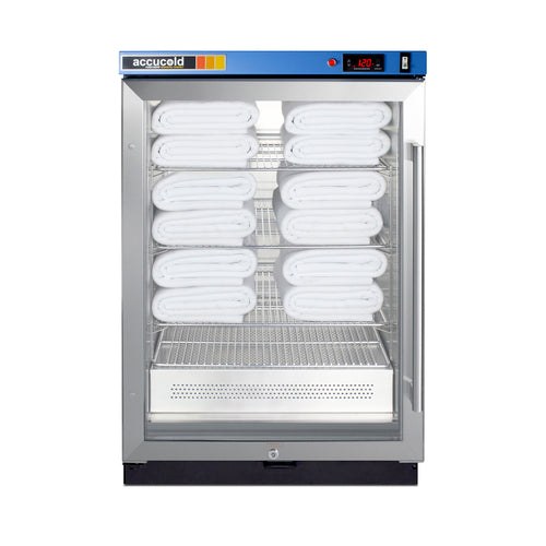 A stainless steel towel warmer with a glass door displays rolled white towels neatly stacked on three shelves. Incorporating passive heating technology, this medical-grade blanket warmer ensures optimal warmth for towels and linens. The digital display reads “120.” The brand label “acucold” is visible at the top of the unit’s blue control panel.
