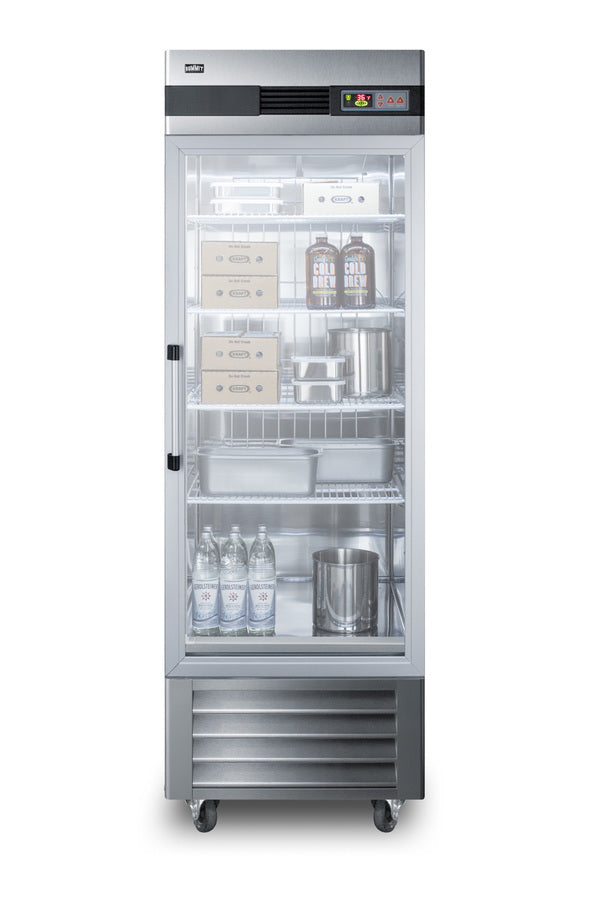 A commercial stainless steel refrigerator with a glass door, containing cold brew bottles, cardboard boxes, metal trays, a metal bucket, and glass bottles of water on three shelves. This commercial refrigerator features a digital display and is mounted on wheels for easy mobility.